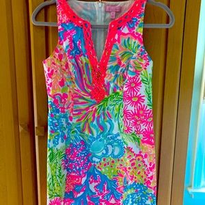 Lilly Pulitzer flower dress with white embroidery.